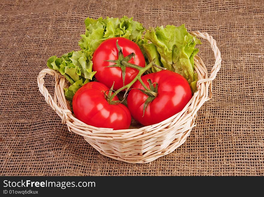 Tomatoes And Lettuce In Basket