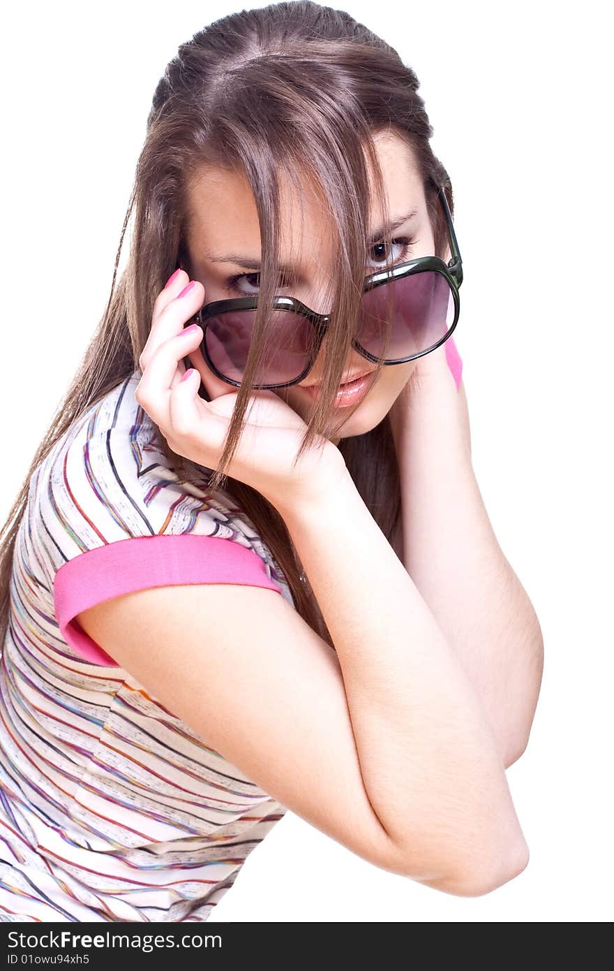 Woman in a pink shirt with the glasses on a white background