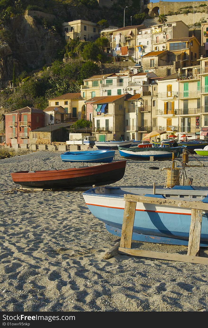 Great sea landscape of Scilla and boat. Sunset. Great sea landscape of Scilla and boat. Sunset