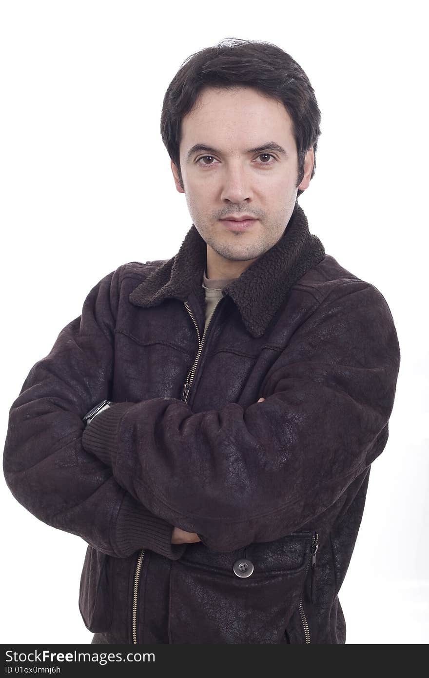 A man with his arms crossed with white background. A man with his arms crossed with white background