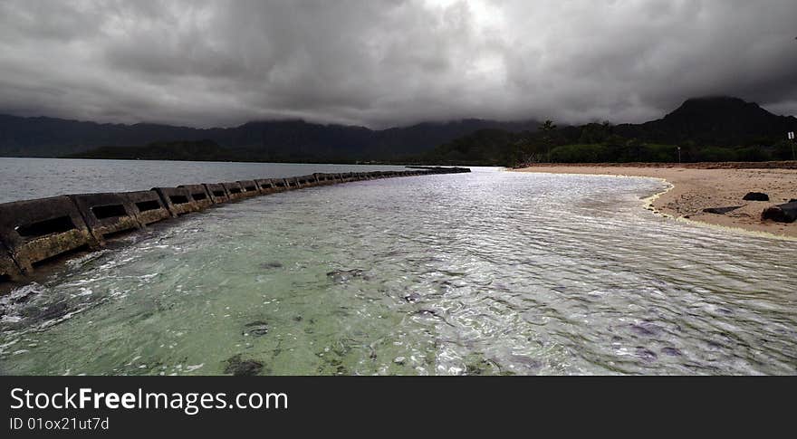 This is a view of the West Side of Oahu's shoreline and mountains as a storm is rolling in. This is a view of the West Side of Oahu's shoreline and mountains as a storm is rolling in.