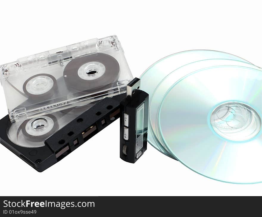 Audiocassettes,cd discs and mp3 player isolated on white