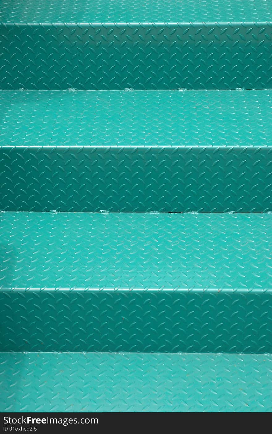 Detail of green metal staircases