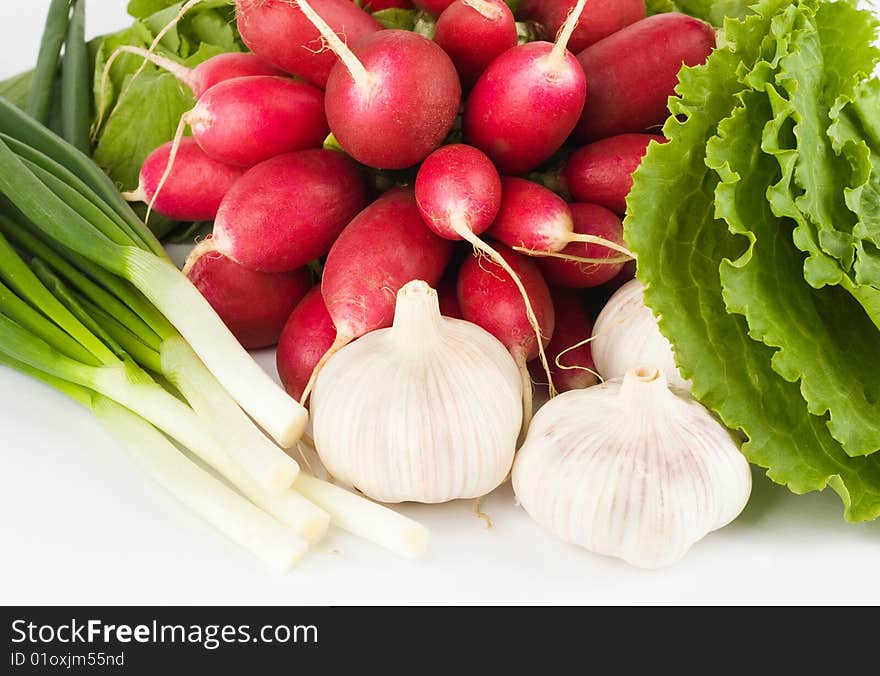 Spring onions, garlic, lettuce and radish