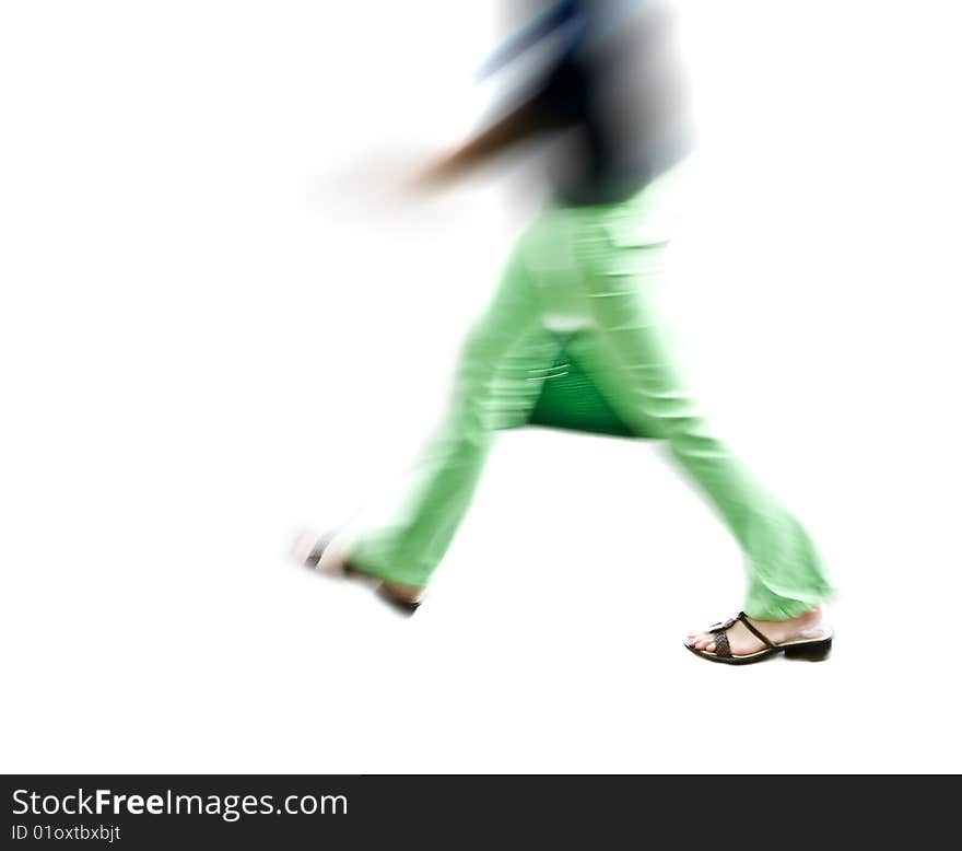 Pedestrian in blurry motion on white. Pedestrian in blurry motion on white