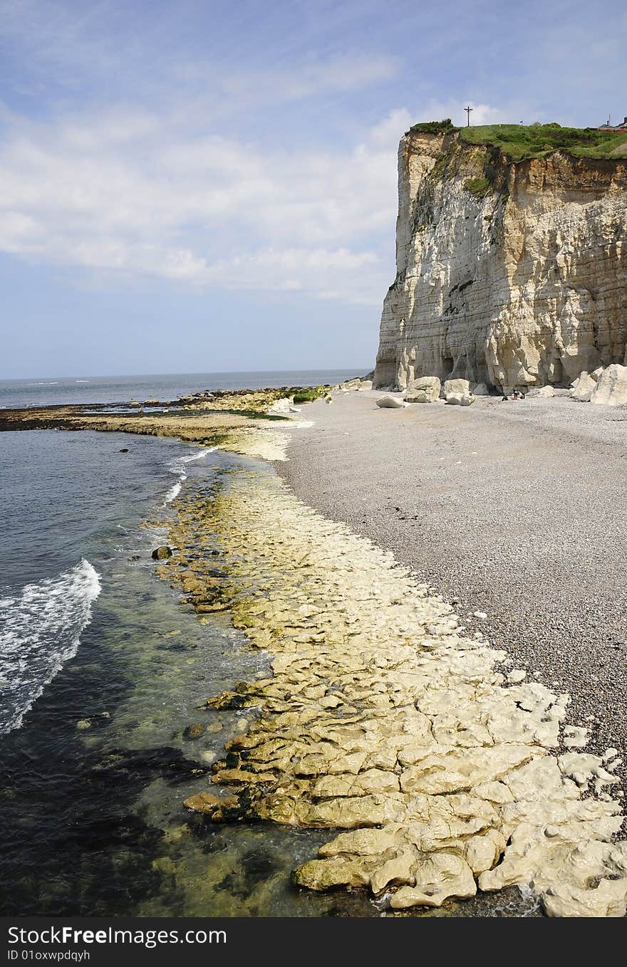 Cliff and the sea coast, landscape of cliff and beach. Cliff and the sea coast, landscape of cliff and beach