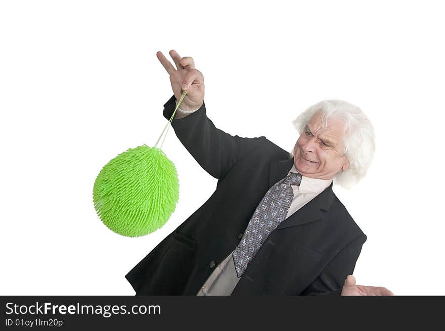 Older man playing with green ball