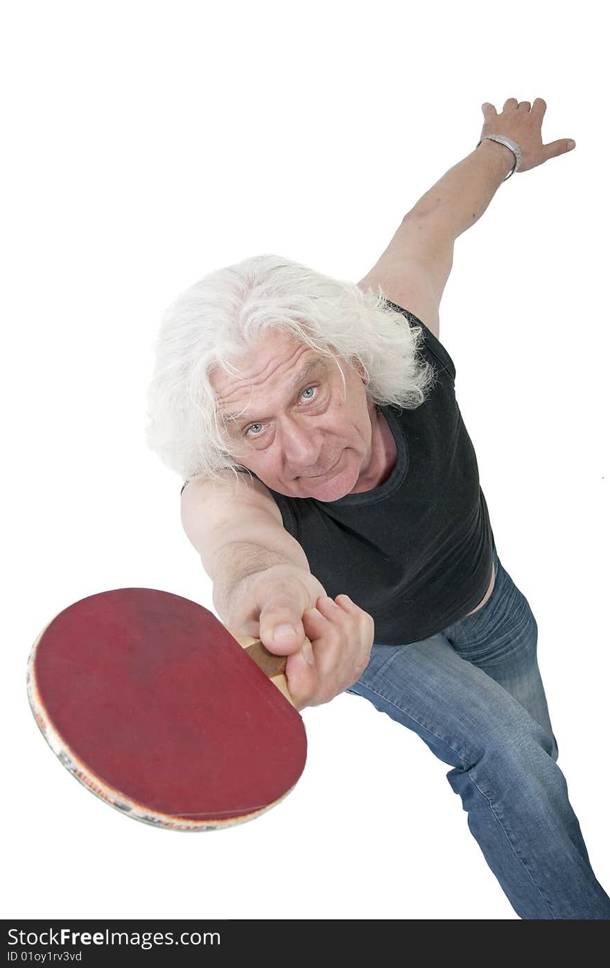 Older man playing table tennis. Older man playing table tennis