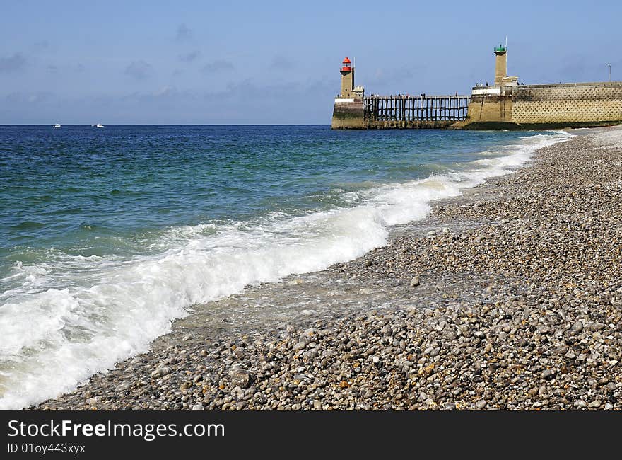 Lighthouse And The Ocean Coast