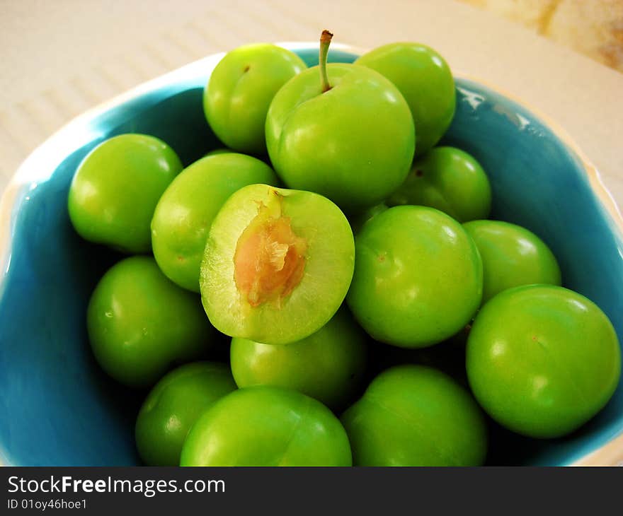 A bowl of fresh green greengage (Ganerik). A bowl of fresh green greengage (Ganerik)