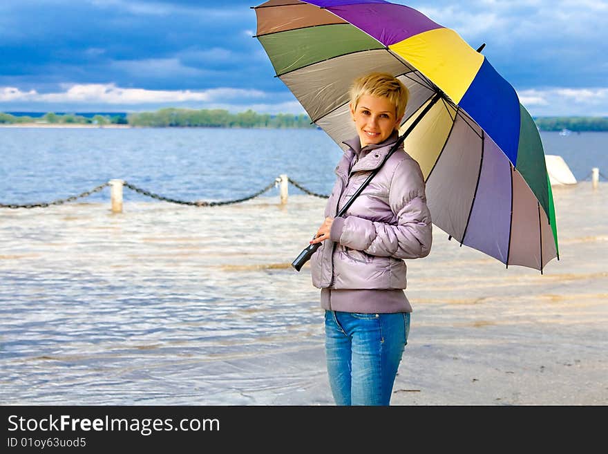 GIRL WITH multi-colour UMBRELLA. GIRL WITH multi-colour UMBRELLA