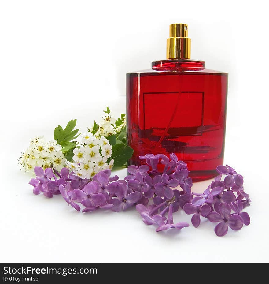 Flowers and bottle of perfume