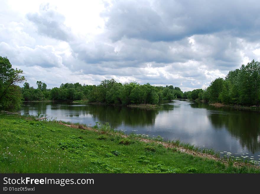 Landscape of trees, the sky and the river. Landscape of trees, the sky and the river