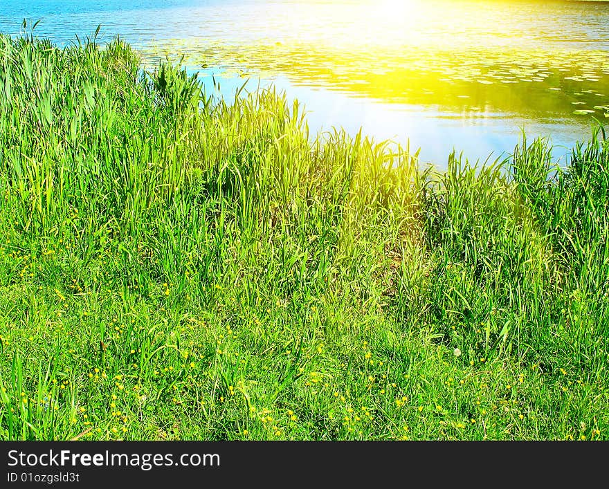 Summer morning over small river and green meadow. Summer morning over small river and green meadow.