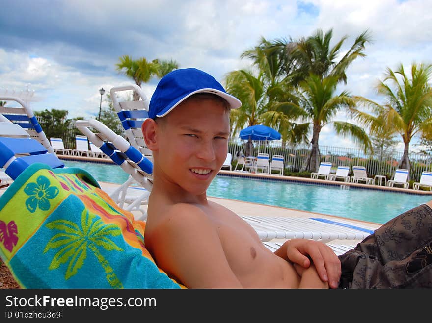 Teen on vacation looking at camera.