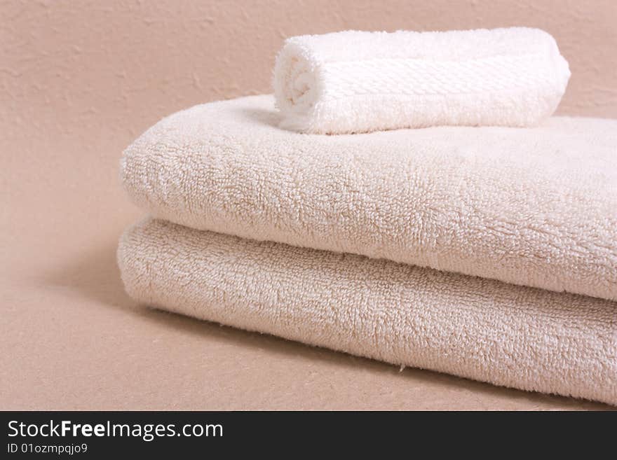 towels on a beoge backgrpund