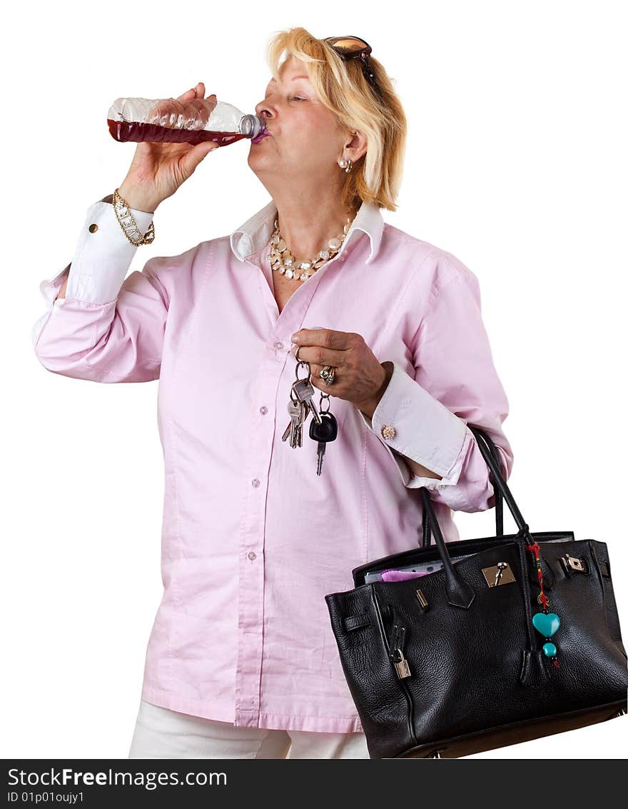 Senior Woman with bottle of juice (isolated on white). Senior Woman with bottle of juice (isolated on white)