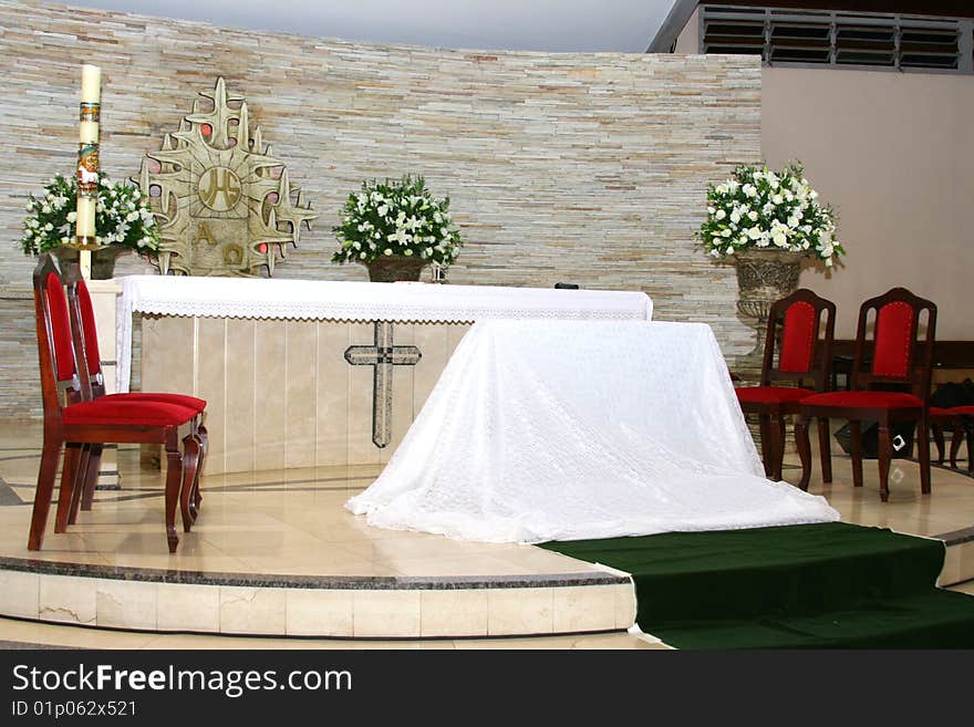 Altar of the church decorated for wedding. Altar of the church decorated for wedding