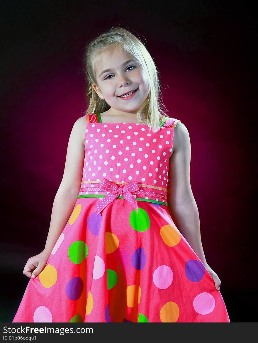 A childs portrait on a black background. A childs portrait on a black background