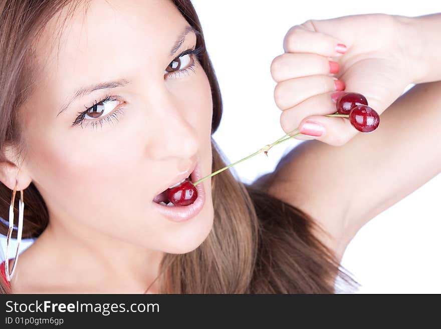 portrait of attractive woman holding cherry isolated on white