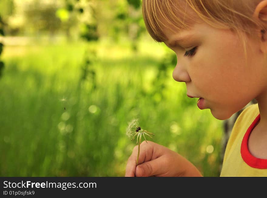 The girl with a dandelion