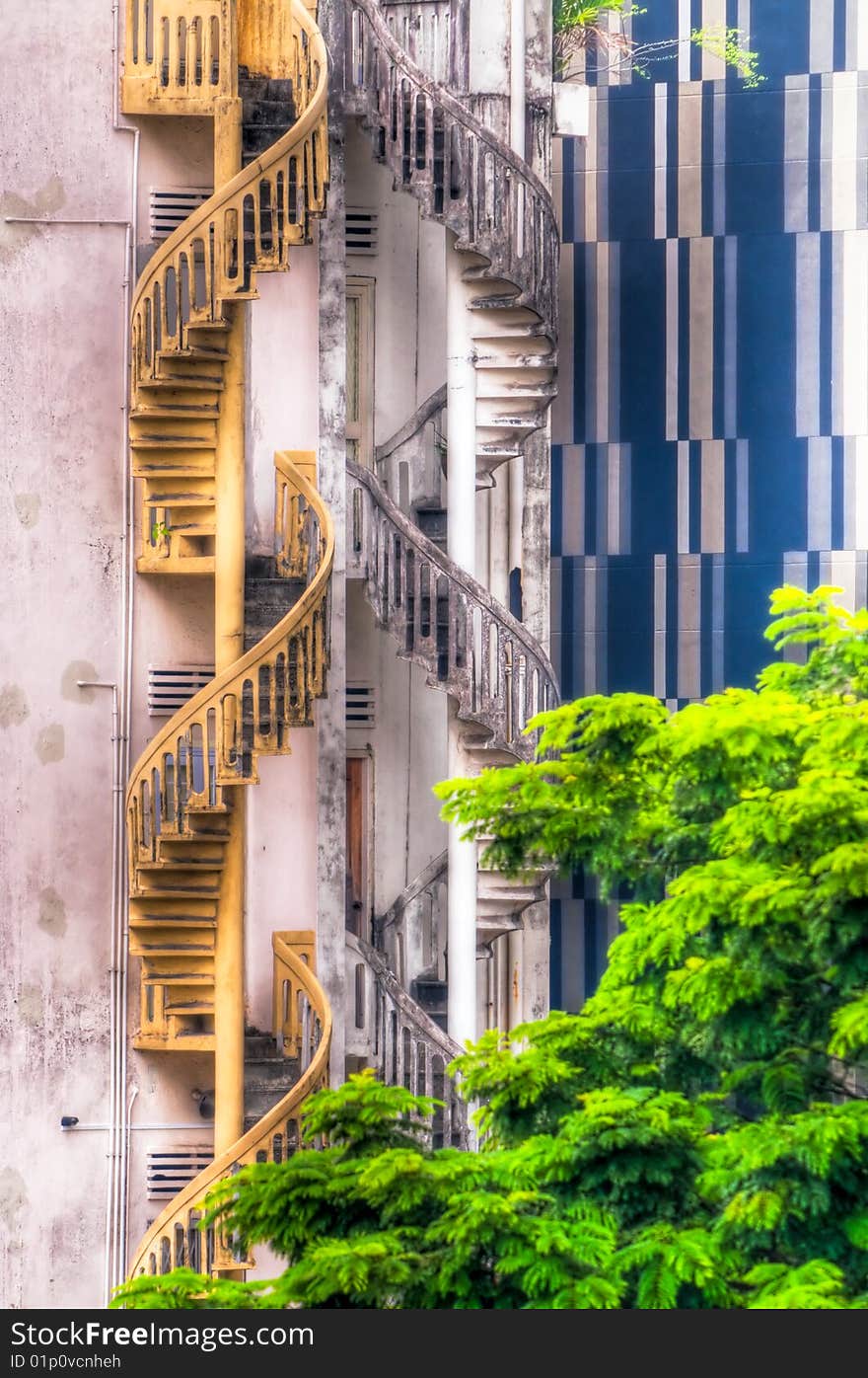 Two spiral staircases side by side in opposite directions. Two spiral staircases side by side in opposite directions