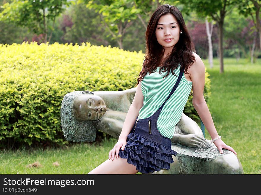 A modern asian girl outdoors. A modern asian girl outdoors.