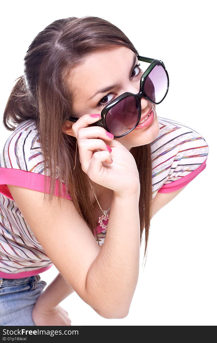 Woman in a pink shirt with the glasses on a white background