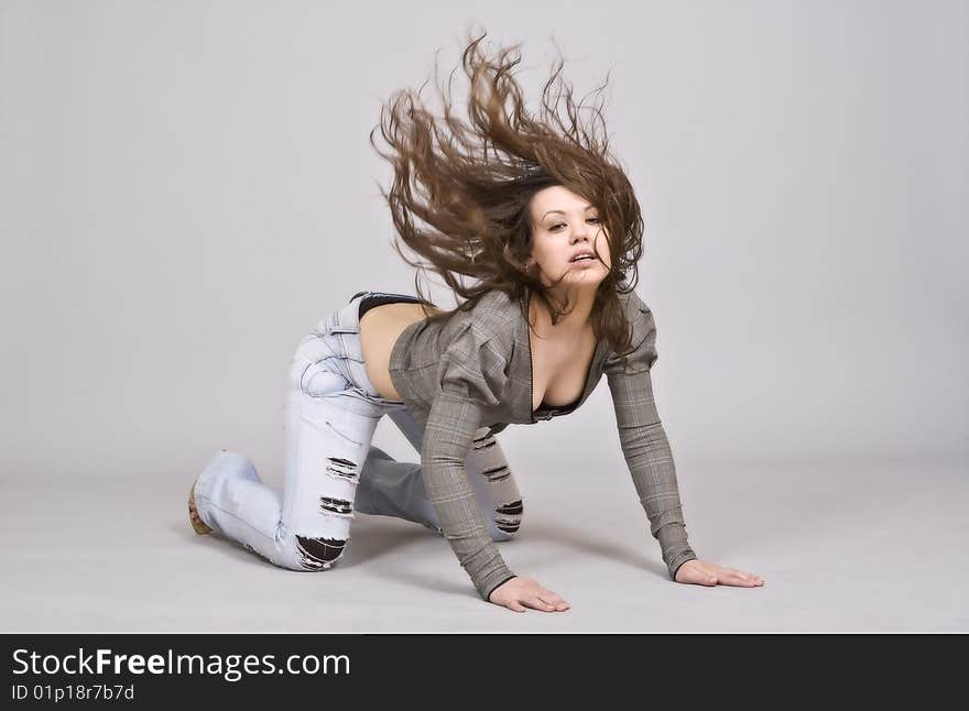 Sexy Young Woman Over Grey Background With Moody L