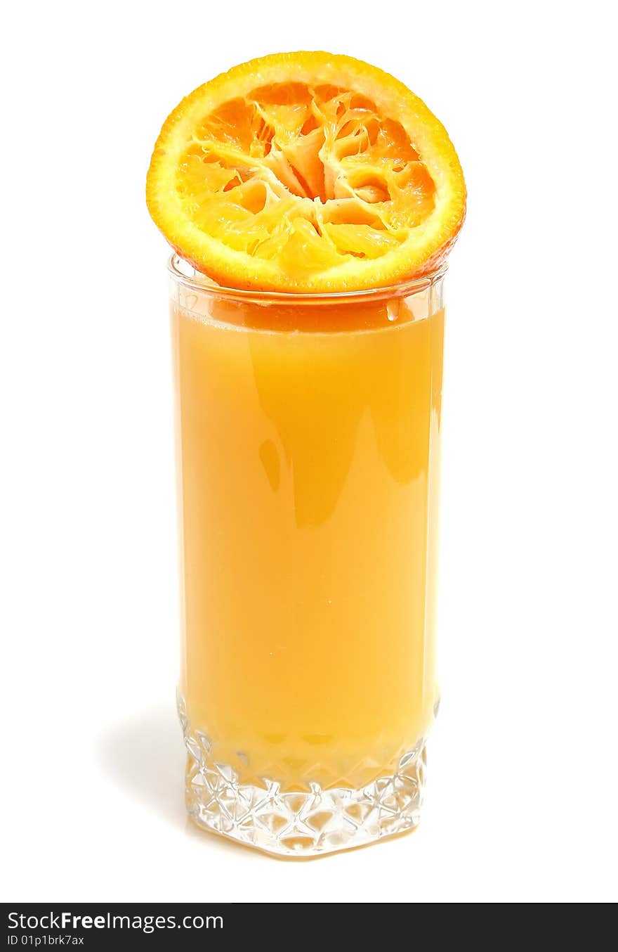 Orange and juice in glass isolated on white background