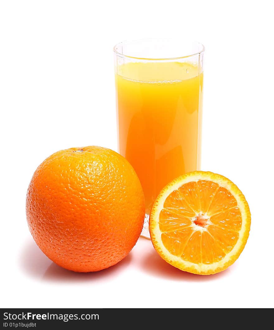 Orange and juice in glass isolated on white background