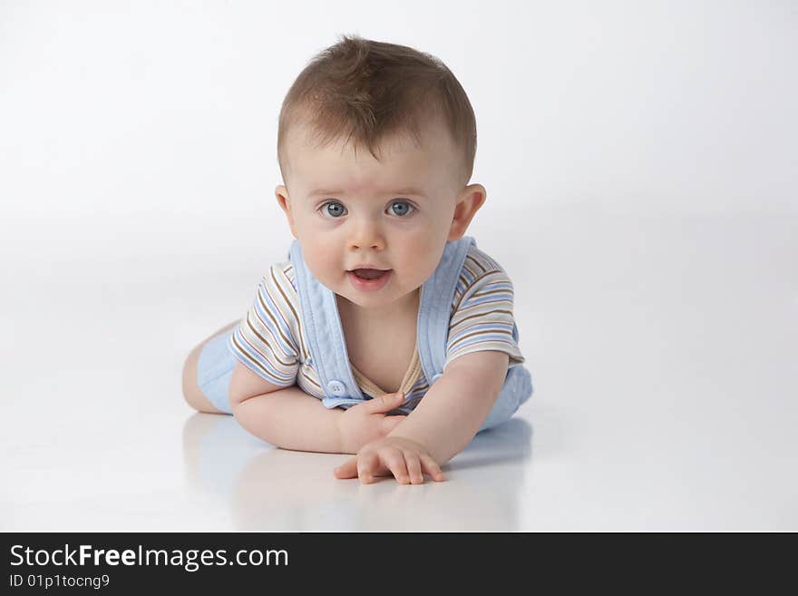 Blue eyed boy on white