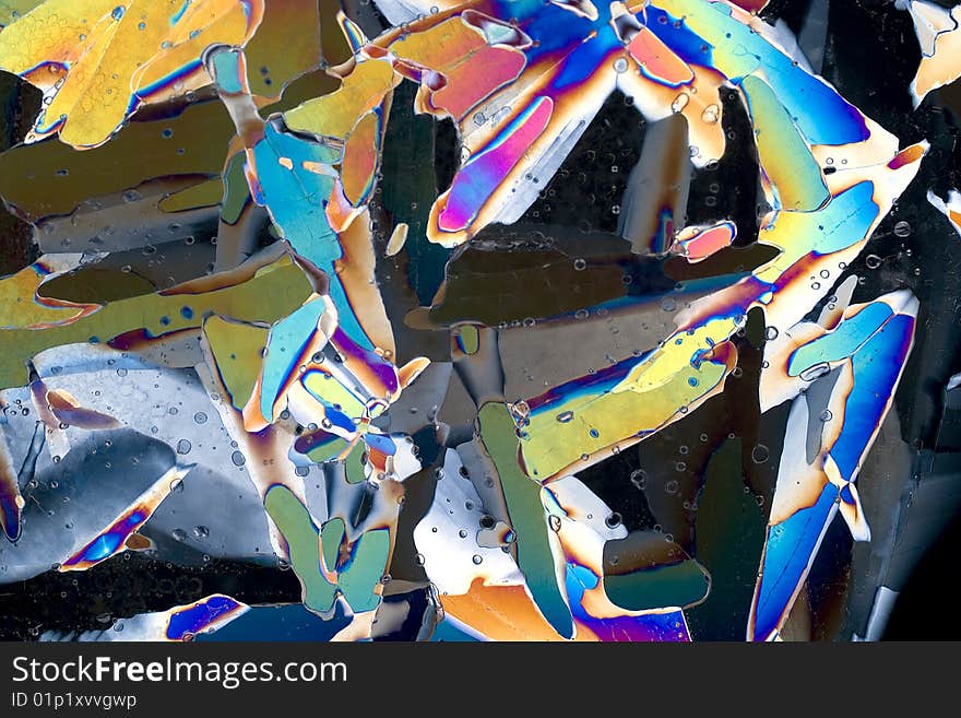 Macro photograph of cross polarized ice crystals.