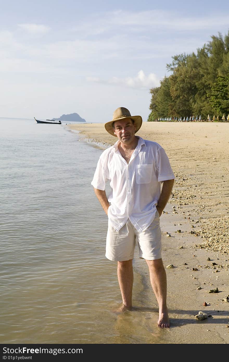 Handsome man on a beach