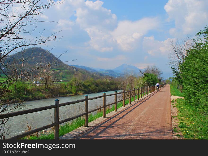 Bicycle path along small river.