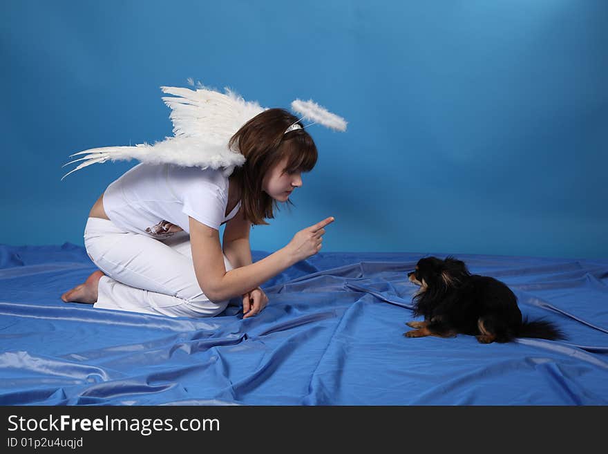 The girl an angel and doggy