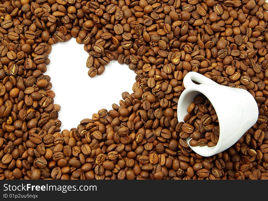 Coffee beans in a white cup