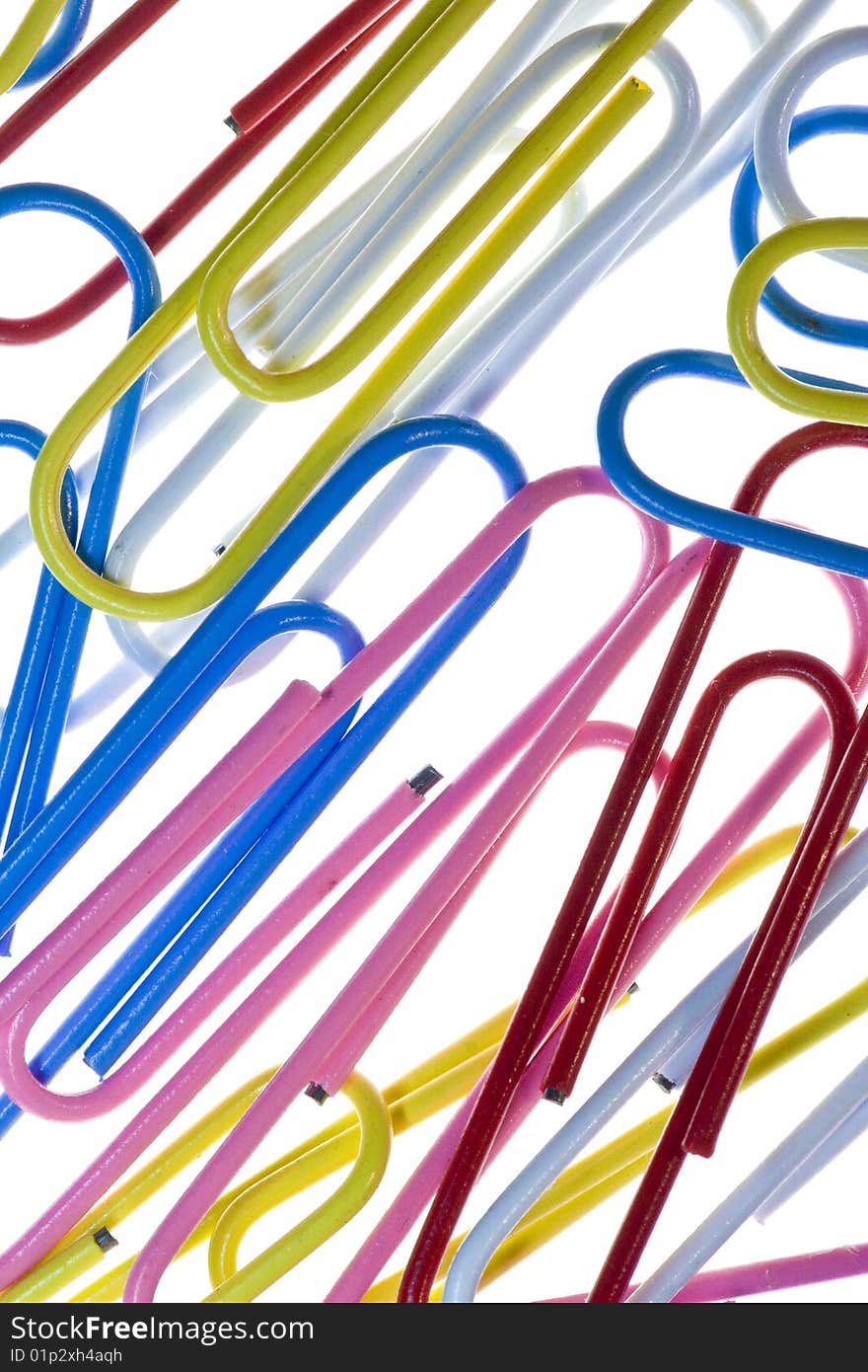 Isolated closeup of paper clips on white background