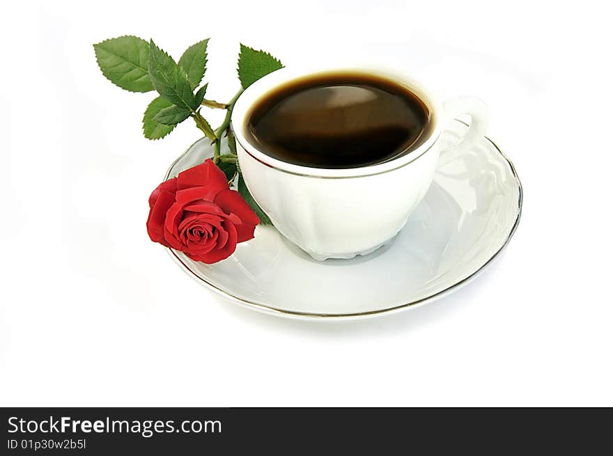 Cup of coffee and small red rose isolated over white. Cup of coffee and small red rose isolated over white.