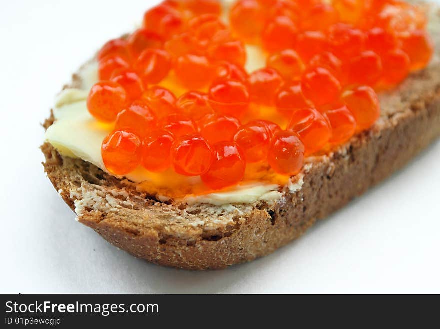 Sandwich with salmon caviar and butter. Sandwich with salmon caviar and butter