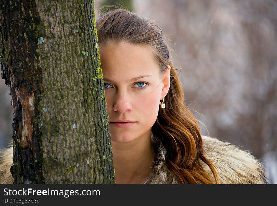 Portrait of a young girl in winter