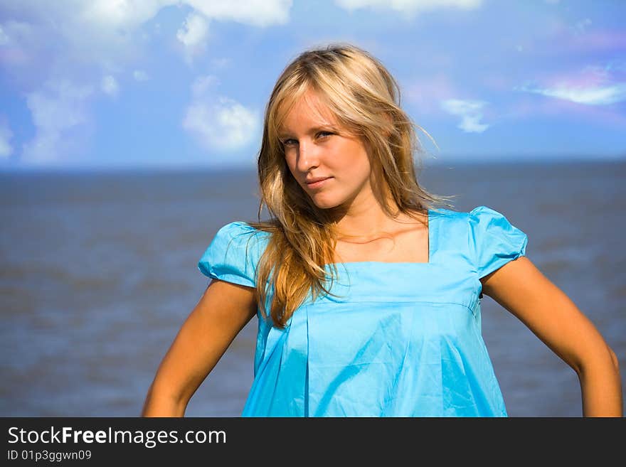 Portrait blondy girl in beach