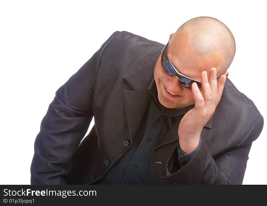 Man in black suit in sun glasses. Isolated on white background