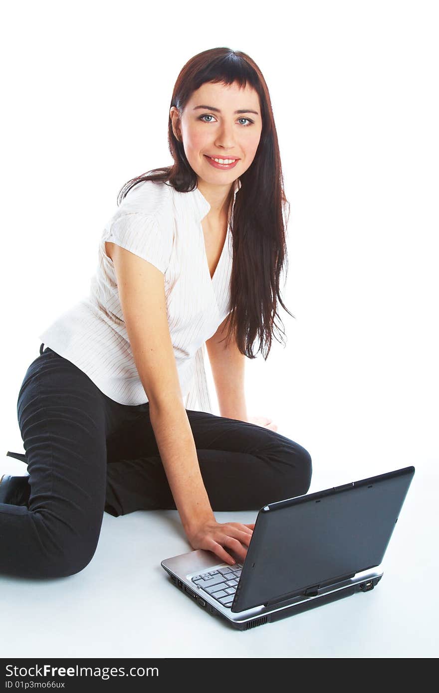 Young woman with laptop. Isolated on white background