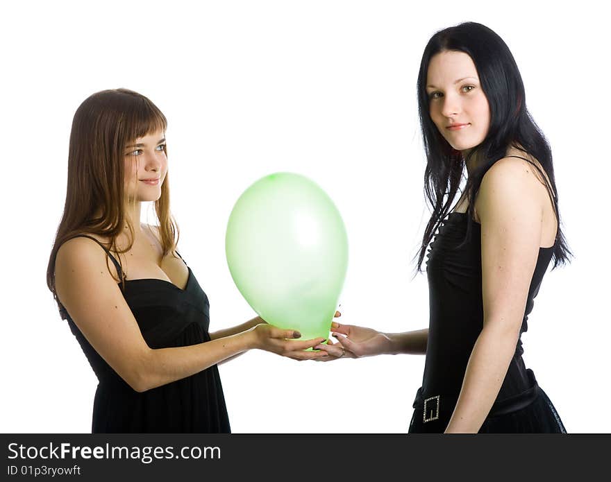 Two young girls with green balloons. Isolated on white background. Two young girls with green balloons. Isolated on white background