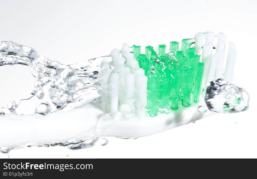 Toothbrushes and water drop.Healthcare