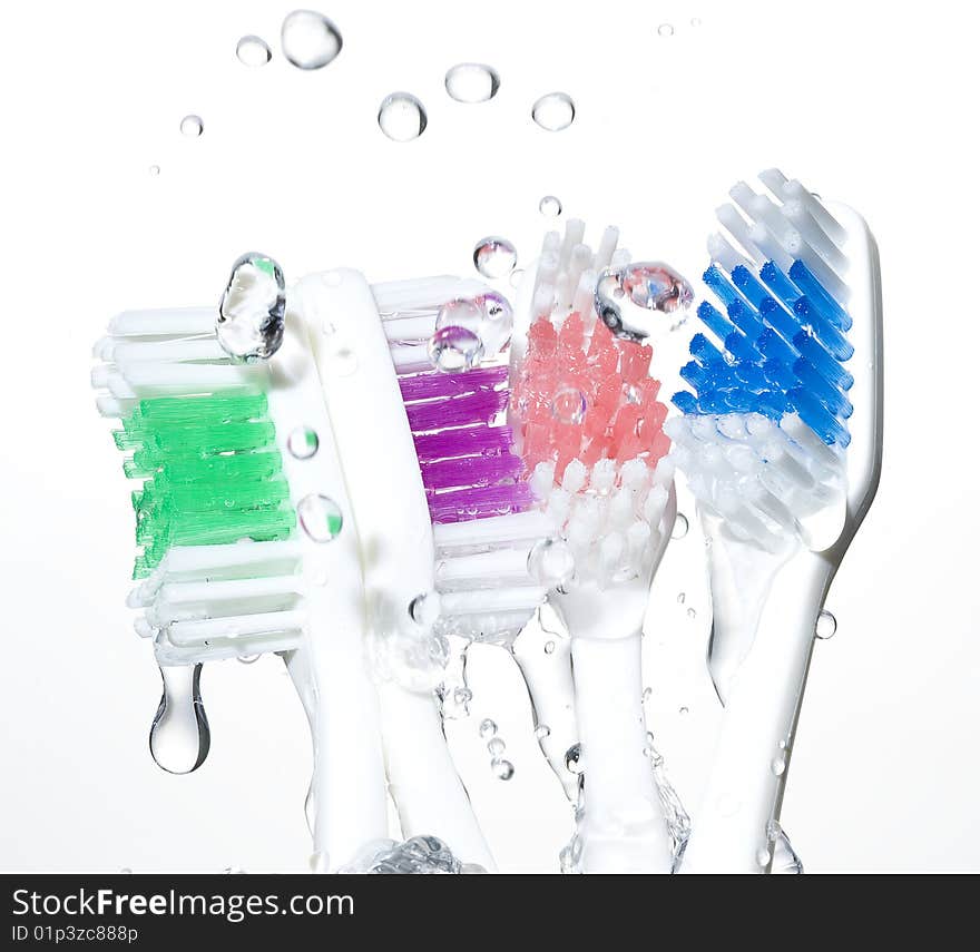 Toothbrushes and water drop.Healthcare