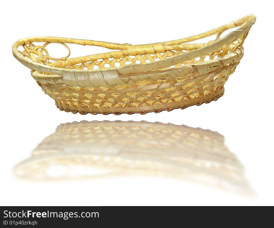 Hand made wooden basket with mirror reflection isolated over white background