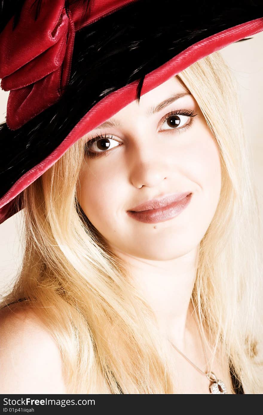 Beautiful young blond female wearing a hat. Beautiful young blond female wearing a hat