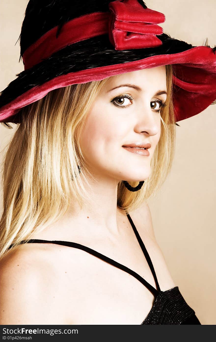 Beautiful young blond female wearing a hat. Beautiful young blond female wearing a hat